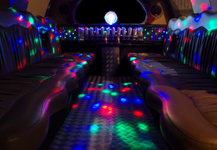 A view of the limousine passenger cabin with coloured lights