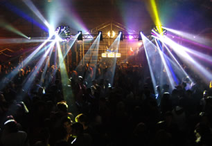 Inside nightclub with people dancing
