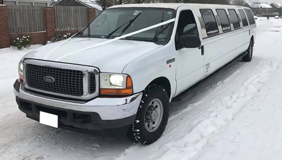 White 16-seater limousine