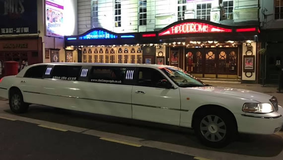White Lincoln Town Car with eight seats