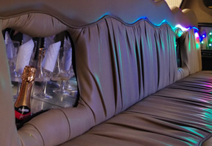 Detailed view of gold coloured seating made from leather and fabric
