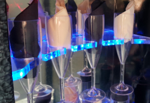 Champagne glasses with backlight bar