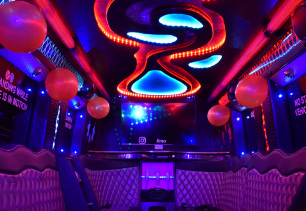 Interior view of Candy Apple part bus showing seating, windows and lights