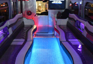 Interior view of vehicle showing seating and lights