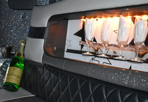 Champagne bottle, ice bucket and bar area